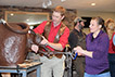 Calving clinic participants practice techniques with help from ISU extension beef veterinarian Grant Dewell.